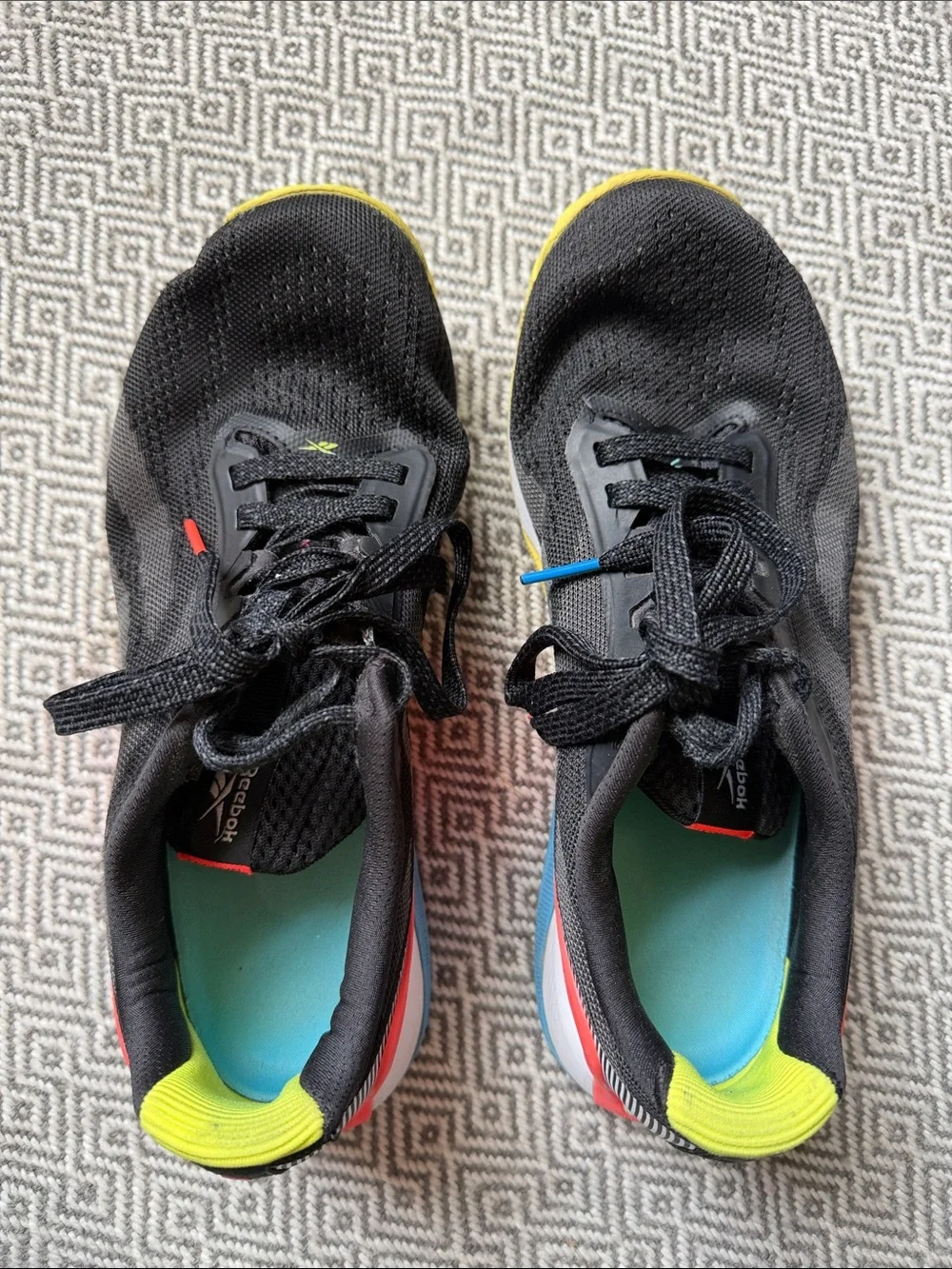 Reebok Nano X1 Black Running Shoes with Yellow, Red and Blue Accents
